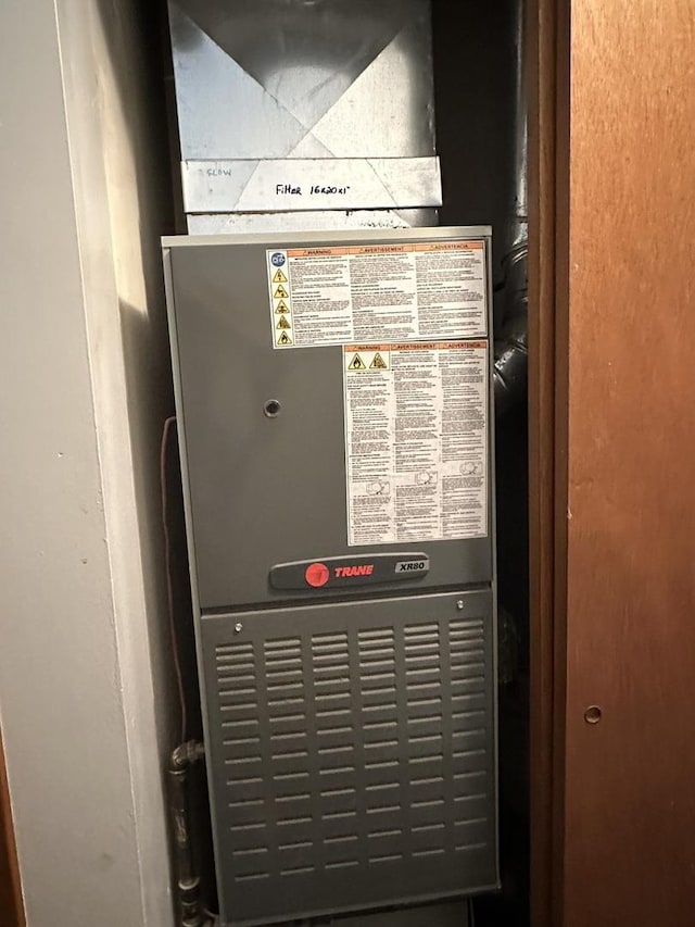 758 Edwin Dr, Bourbonnais, IL 60914 - utility room featuring heating unit
