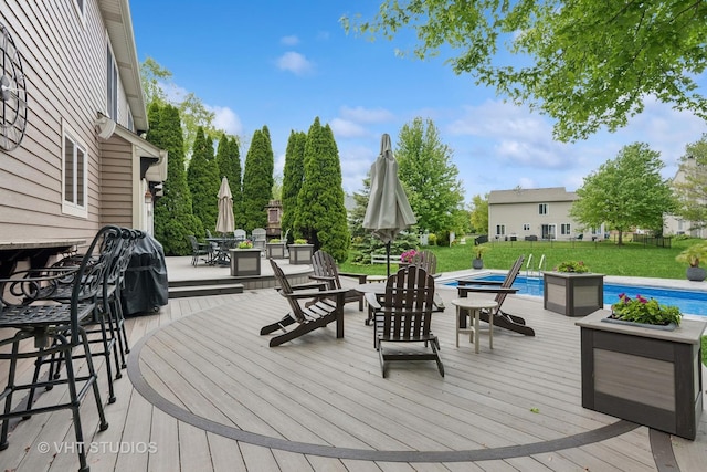 384 Edgewater Ct, Sugar Grove, IL 60554 - wooden deck featuring outdoor dining space, an outdoor pool, and a lawn