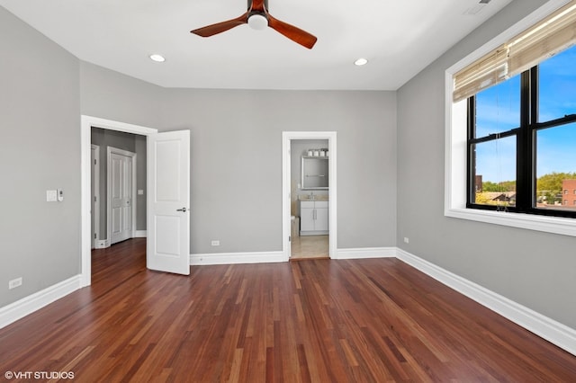 3641 N Ashland Ave Unit 4N, Chicago, IL 60613 - unfurnished bedroom featuring wood finished floors, baseboards, recessed lighting, and connected bathroom