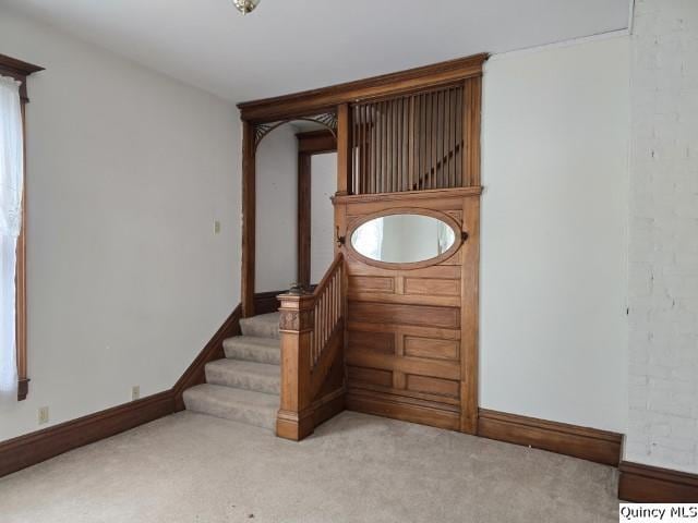 722 Wabash Ave, Carthage, IL 62321 - stairway featuring baseboards and carpet flooring