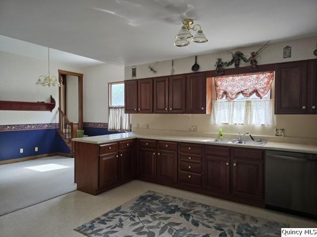 722 Wabash Ave, Carthage, IL 62321 - kitchen featuring dishwashing machine, a chandelier, light countertops, a sink, and wallpapered walls