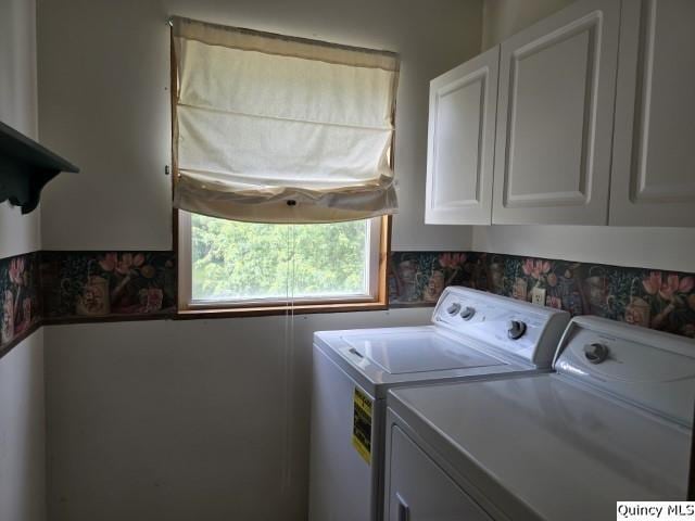 722 Wabash Ave, Carthage, IL 62321 - clothes washing area with cabinet space and separate washer and dryer