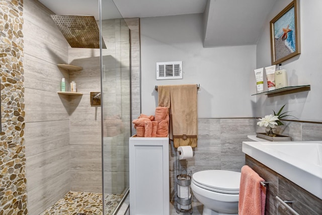 12613 S Keeler Ave, Alsip, IL 60803 - bathroom featuring tiled shower, toilet, a wainscoted wall, tile walls, and vanity