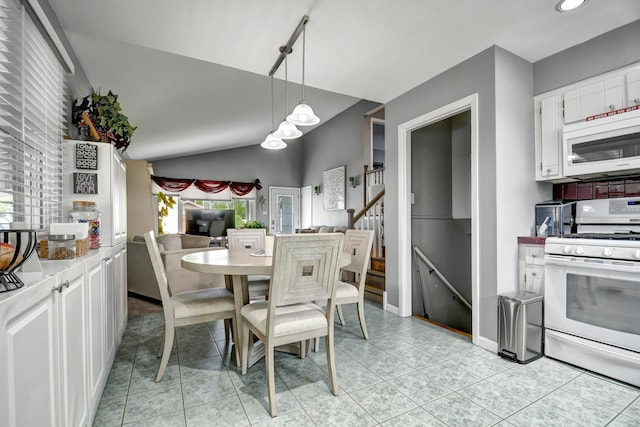 12613 S Keeler Ave, Alsip, IL 60803 - dining area featuring vaulted ceiling, stairway, light tile patterned floors, and recessed lighting