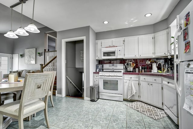 12613 S Keeler Ave, Alsip, IL 60803 - kitchen with white appliances, dark countertops, white cabinets, recessed lighting, and pendant lighting