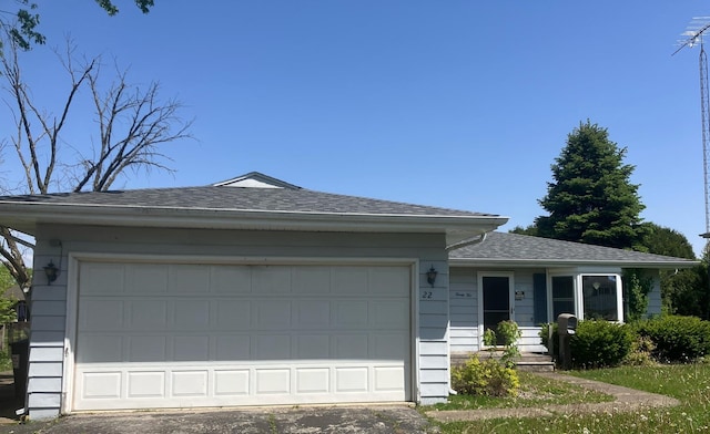 22 Emery Dr, Bourbonnais, IL 60914 - single story home featuring an attached garage, driveway, and a shingled roof