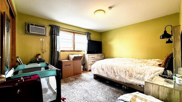 bedroom with a wall mounted air conditioner