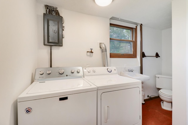 311 Hillside Ln, Bloomington, IL 61701 - washroom featuring electric panel and washer and dryer