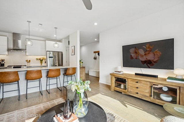 2743 N Ashland Ave Unit 2S, Chicago, IL 60614 - living room with light wood-type flooring, recessed lighting, baseboards, and ceiling fan