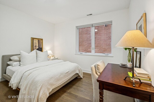 2743 N Ashland Ave Unit 2S, Chicago, IL 60614 - bedroom with wood finished floors, baseboards, and an office area