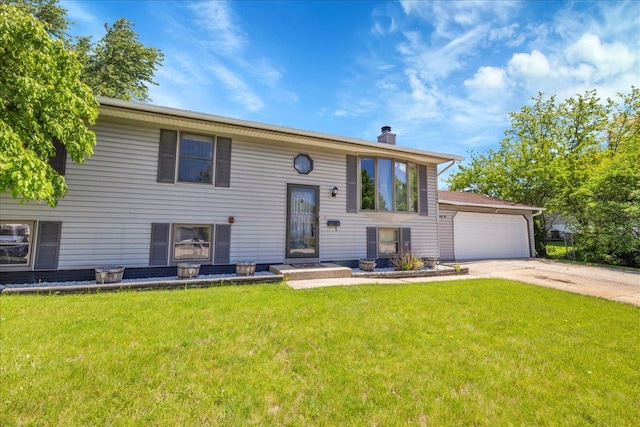 1264 N Kennedy Dr, Streamwood, IL 60107 - split foyer home with a front lawn, a chimney, a garage, and concrete driveway