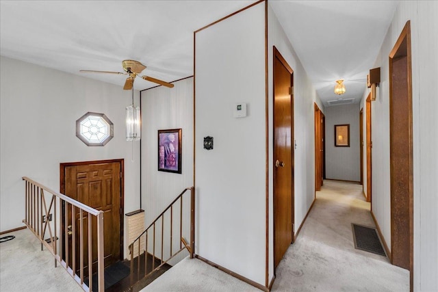 1264 N Kennedy Dr, Streamwood, IL 60107 - corridor featuring an upstairs landing, light colored carpet, and baseboards