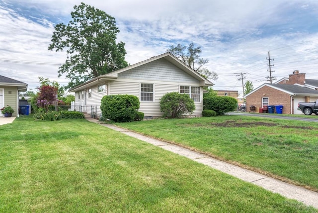 1408 E Evergreen St, Wheaton, IL 60187 - view of home's exterior featuring a lawn