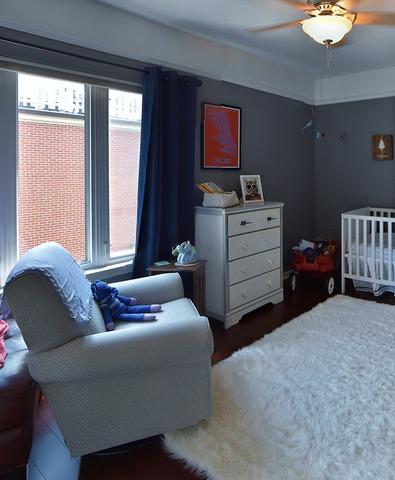 bedroom featuring wood finished floors and ceiling fan