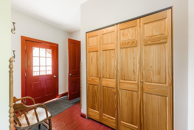 706 Washington Ave, Dixon, IL 61021 - entryway with dark wood-style flooring and baseboards