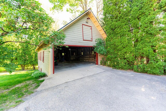 706 Washington Ave, Dixon, IL 61021 - view of home's exterior with a garage