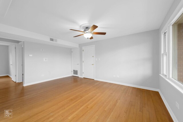 6758 W 64th Pl Unit 13, Chicago, IL 60638 - unfurnished room featuring ceiling fan, light wood-type flooring, and baseboards