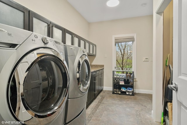 122 Ravine Ln, Barrington, IL 60010 - clothes washing area with washing machine and clothes dryer, cabinet space, and baseboards