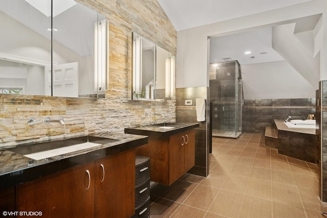122 Ravine Ln, Barrington, IL 60010 - full bathroom with tile walls, a bath, two vanities, tiled shower, and lofted ceiling