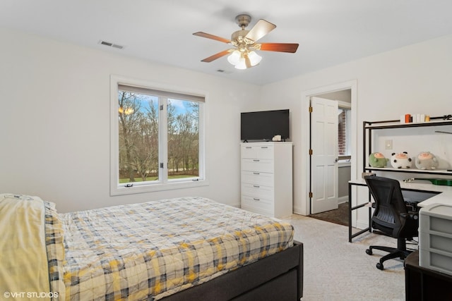 122 Ravine Ln, Barrington, IL 60010 - carpeted bedroom featuring a desk, baseboards, and a ceiling fan