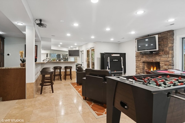 122 Ravine Ln, Barrington, IL 60010 - game room with a fireplace, recessed lighting, and light tile patterned floors