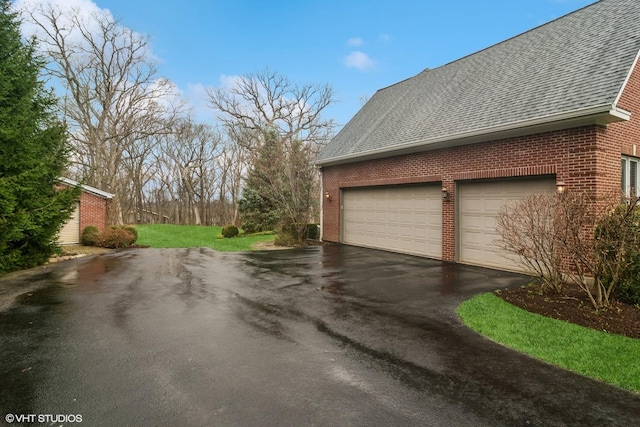 122 Ravine Ln, Barrington, IL 60010 - garage featuring asphalt driveway