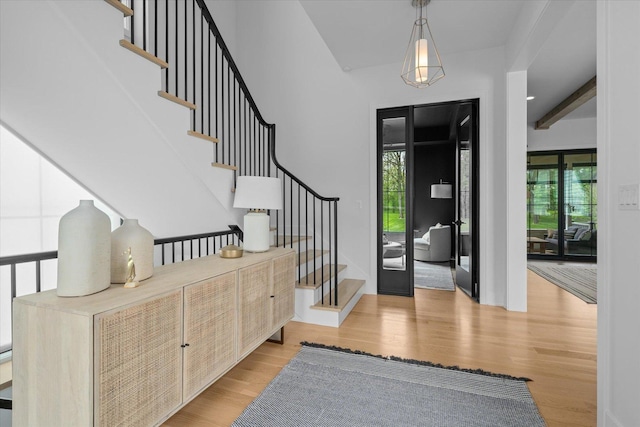 2S384 Madison St, Wheaton, IL 60189 - foyer entrance featuring healthy amount of natural light, light wood-style floors, and stairway