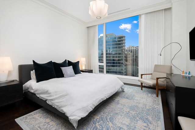 9 W Walton St Unit 1702, Chicago, IL 60610 - bedroom with wood finished floors and crown molding