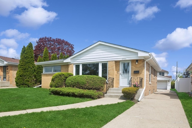 6956 Seward St, Niles, IL 60714 - view of front of property featuring brick siding and a front yard