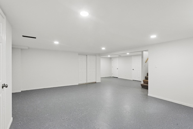 6956 Seward St, Niles, IL 60714 - finished basement with recessed lighting, stairway, and baseboards