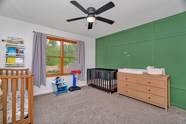 817 W 3rd St, Braidwood, IL 60408 - bedroom featuring carpet, a crib, ceiling fan, a closet, and baseboards
