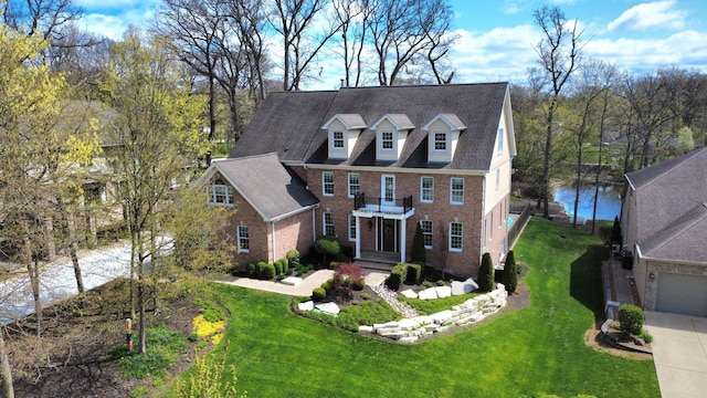 242 Hampshire Ct, New Lenox, IL 60451 - colonial house with brick siding and a front yard