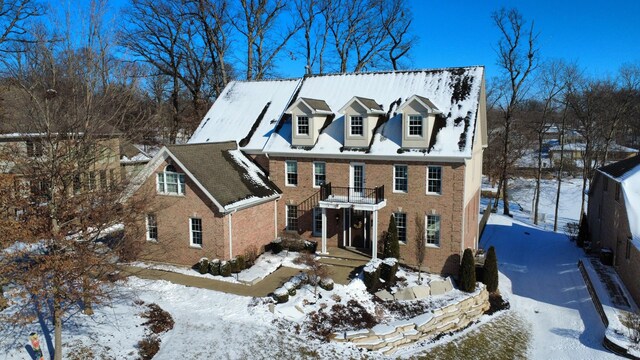 242 Hampshire Ct, New Lenox, IL 60451 - colonial house featuring a balcony and brick siding