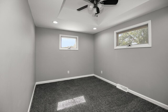 1195 W Williams St, Kankakee, IL 60901 - empty room featuring recessed lighting, baseboards, a ceiling fan, and dark carpet