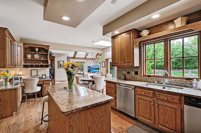 2 Hampton Ct, Burr Ridge, IL 60527 - kitchen with dishwasher, a sink, open shelves, light stone countertops, and recessed lighting