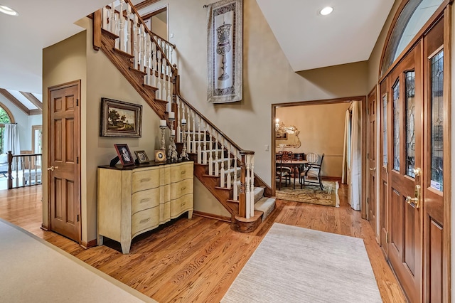 2 Hampton Ct, Burr Ridge, IL 60527 - foyer featuring light wood finished floors, stairway, baseboards, and recessed lighting