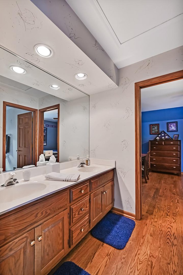 2 Hampton Ct, Burr Ridge, IL 60527 - bathroom featuring wood finished floors, double vanity, ensuite bath, recessed lighting, and baseboards