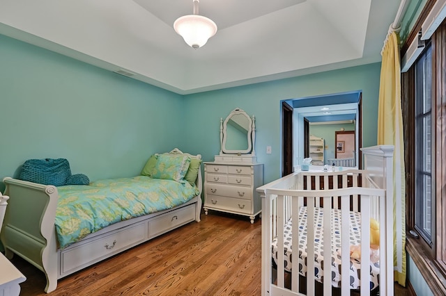 2 Hampton Ct, Burr Ridge, IL 60527 - bedroom with wood finished floors and a tray ceiling