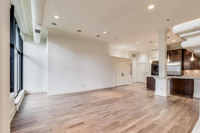 333 W Hubbard St Unit 704, Chicago, IL 60654 - empty room with wood finished floors, ceiling fan, baseboards, ornamental molding, and recessed lighting