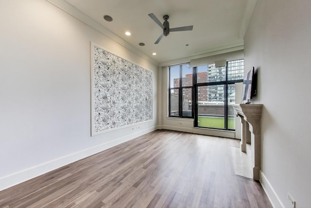 333 W Hubbard St Unit 704, Chicago, IL 60654 - unfurnished room featuring a ceiling fan, wood finished floors, and baseboards