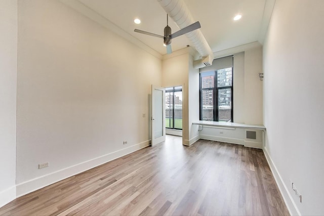 333 W Hubbard St Unit 704, Chicago, IL 60654 - unfurnished room with a ceiling fan, wood finished floors, baseboards, and recessed lighting