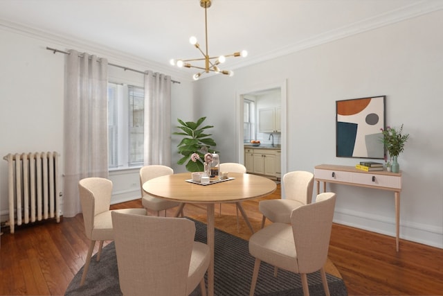 6205 N Oakley St Unit 3, Chicago, IL 60659 - dining area with radiator heating unit, wood finished floors, a chandelier, ornamental molding, and baseboards