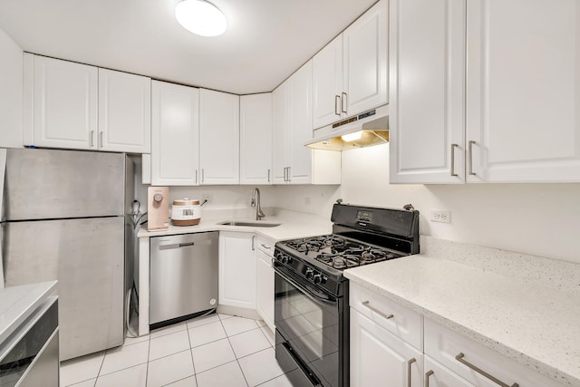 2005 Valencia Dr Unit 207D, Northbrook, IL 60062 - kitchen with stainless steel appliances, under cabinet range hood, a sink, and white cabinets