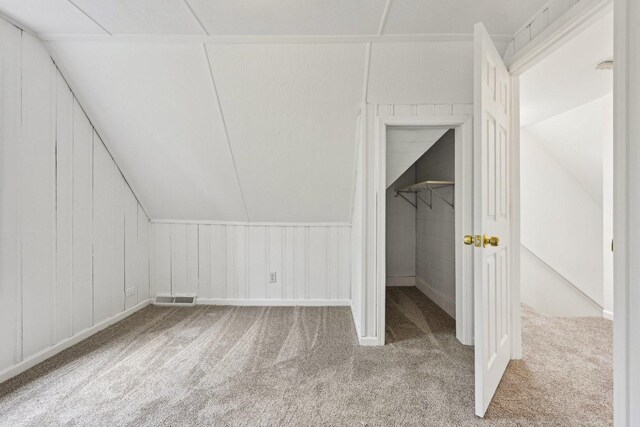 28549 W High Rd, Ingleside, IL 60041 - additional living space with carpet floors and lofted ceiling