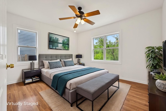28549 W High Rd, Ingleside, IL 60041 - bedroom featuring baseboards, wood finished floors, and a ceiling fan