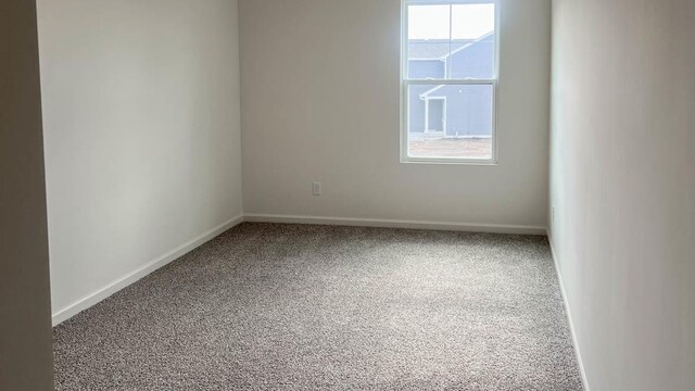 5010 Linden Rd, Mount Pleasant, WI 53403 - carpeted spare room with baseboards