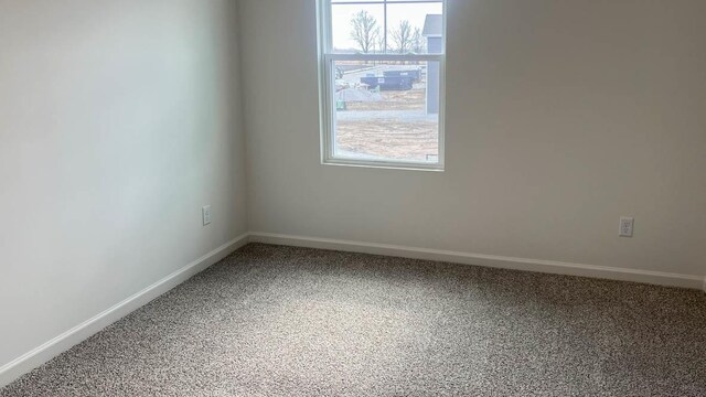 5010 Linden Rd, Mount Pleasant, WI 53403 - carpeted empty room with baseboards