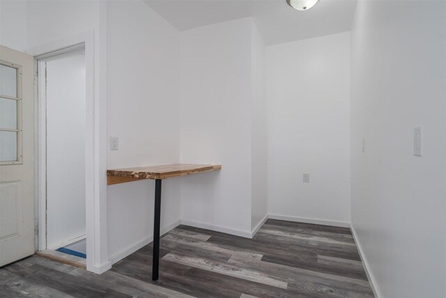 303 S Main St, Flanagan, IL 61740 - unfurnished dining area featuring wood finished floors and baseboards