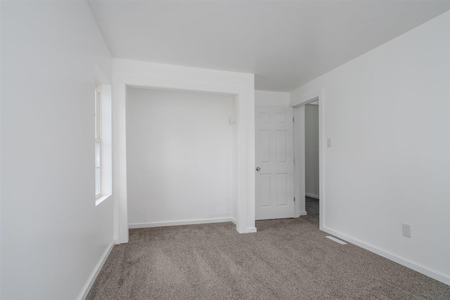 303 S Main St, Flanagan, IL 61740 - carpeted spare room with baseboards