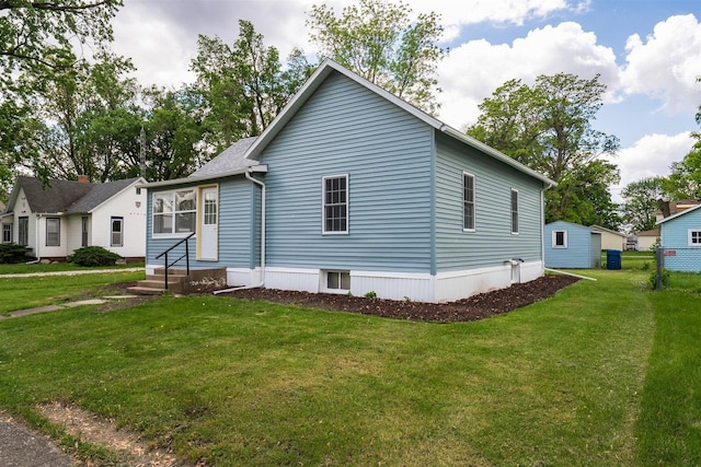 303 S Main St, Flanagan, IL 61740 - view of front facade with entry steps and a front yard